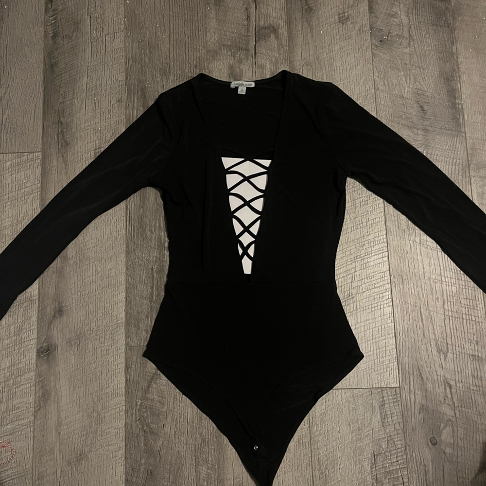 Black Charlotte Russe lace up long sleeve bodysuit size medium